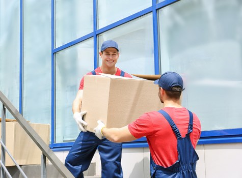 Furniture being moved carefully from a local home