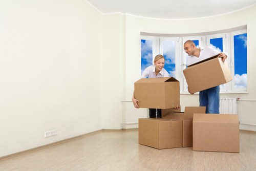 Relocation team loading office items for transport