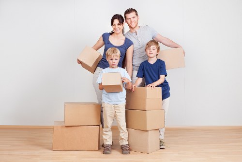Sturdy cardboard boxes and packing materials prepared for a local move