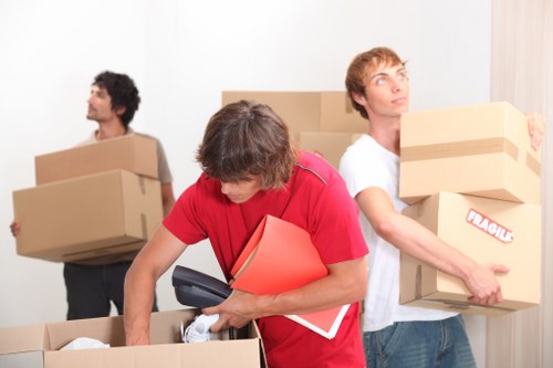 Careful loading of unwanted furniture during a local Eltham collection