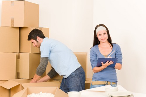 Household boxes and furniture ready for moving day in Eltham